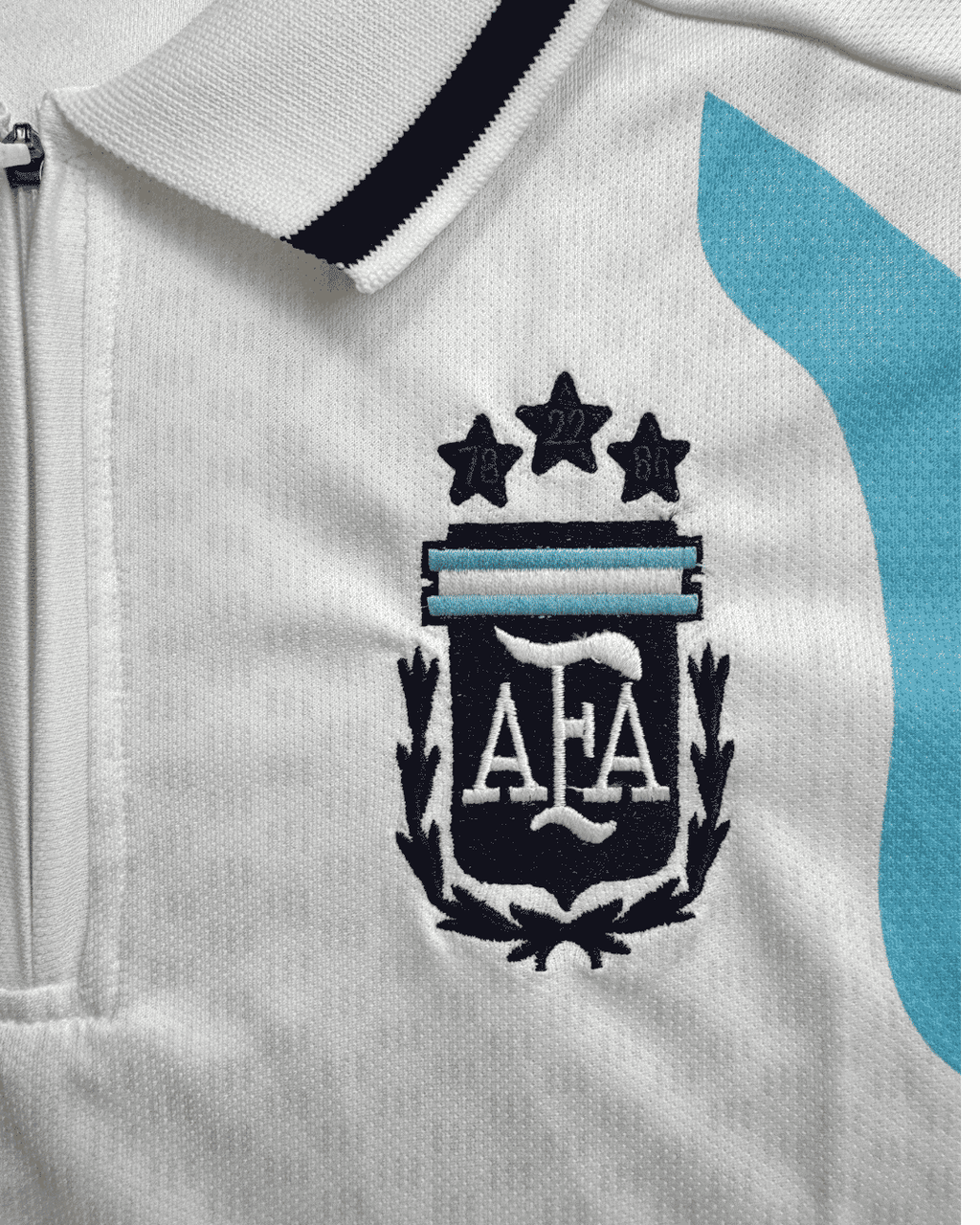 ARGENTINA 2026 TRAINING KIT - POLO (HALF SLEVEE ) ZIP -EMBROIDERY